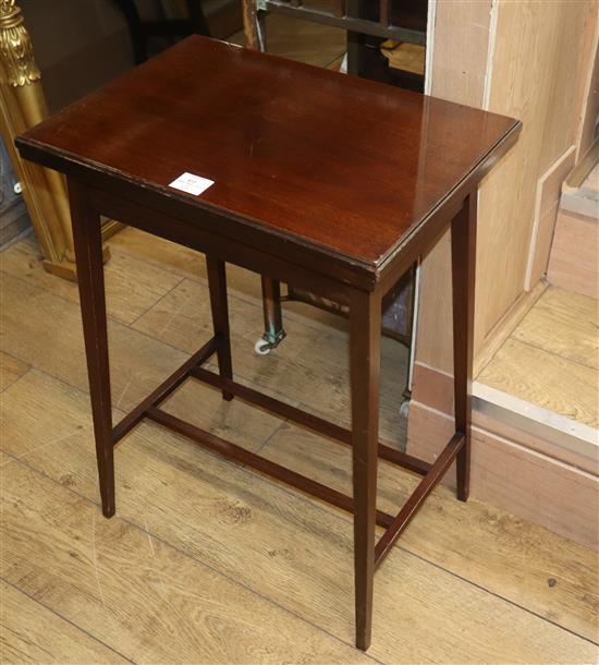 An Edwardian mahogany swivel and fold over games table, circa 1910 W.51cm